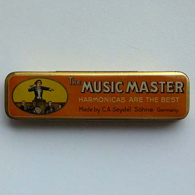 The Music Master, Blechdose, Harmonika